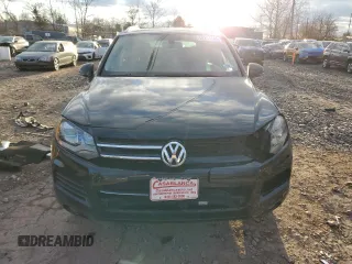 2012 Volkswagen Touareg Sport z VIN WVGEF9BP7CD006020, wystawiony jako Copart lot #88211145 z przebiegiem 180 729 mil mil oraz Szkoda całkowita • Salvage title. Historia ofert i sprzedaży dostępna na DreamBid. Obrazek 5.