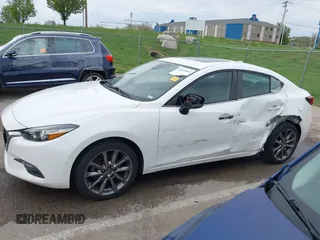 2018 Mazda 3 Touring with VIN 3MZBN1V32JM190611, listed as a IAAI auction lot 42032844 with 63,493 mi miles and . Bid and sale history available at DreamBid. Image 15.