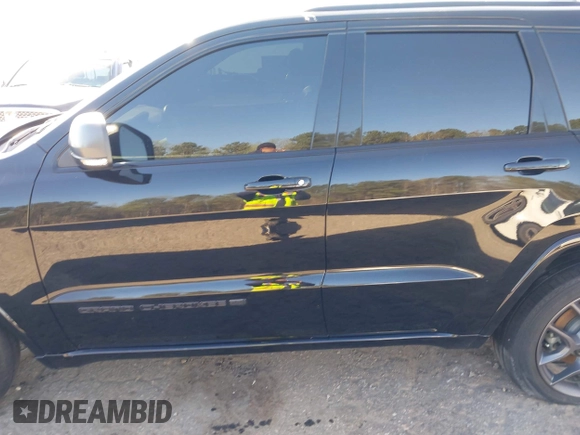 2021 Jeep Grand Cherokee Limited with VIN 1C4RJFBG6MC676961, listed as a IAAI auction lot 41898352 with 28,645 mi miles and . Bid and sale history available at DreamBid. Image 14.