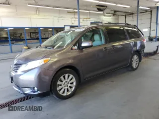 2011 Toyota Sienna XLE with VIN 5TDDK3DCXBS029281, listed as a Copart auction lot 63157675 with 67,127 mi miles and Salvage title. Bid and sale history available at DreamBid. Image 1.