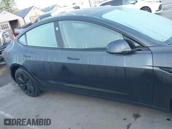 2025 Tesla Model 3 Long Range with VIN 5YJ3E1EA1SF877851, listed as a IAAI auction lot 41917772 with 2,313 mi miles and . Bid and sale history available at carsss.com. Image 12.