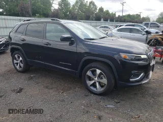 2022 Jeep Cherokee Limited with VIN 1C4PJMDN2ND535615, listed as a Copart auction lot 60552614 with 14,084 mi miles and Salvage title. Bid and sale history available at DreamBid. Image 4.
