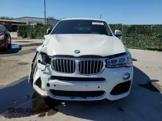 2015 BMW X4 xDrive35i with VIN 5UXXW5C54F0E87831, listed as a Copart auction lot 43763654 with 86,297 mi miles. Bid and sale history available at carsss.com. Image 5.