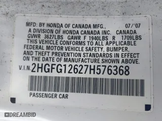 2007 Honda Civic Cpe LX with VIN 2HGFG12627H576368, listed as a IAAI auction lot 42015130 with 202,342 mi miles. Bid and sale history available at carsss.com. Image 9.