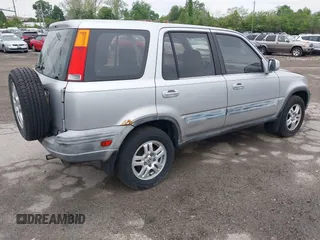 2001 Honda CR-V EX with VIN JHLRD186X1C012315, listed as a IAAI auction lot 42174243 with 162,957 mi miles and . Bid and sale history available at DreamBid. Image 4.