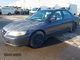1998 Honda Accord LX z VIN 1HGCG5642WA046417, wystawiony jako IAAI lot #41945037 z przebiegiem Nie podano mil oraz . Historia ofert i sprzedaży dostępna na DreamBid. Obrazek 17.