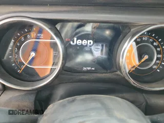 2023 Jeep Gladiator Mojave z VIN 1C6JJTEG7PL548084, wystawiony jako Copart lot #52827265 z przebiegiem 26 789 mil mil oraz Czysty tytuł • Clean title. Historia ofert i sprzedaży dostępna na DreamBid. Obrazek 9.