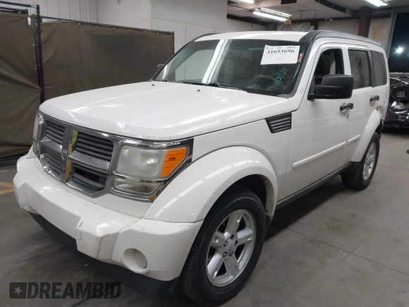 2007 Dodge Nitro SLT with VIN 1D8GU58K97W583408, listed as a IAAI auction lot 41653696 with 124,449 mi miles. Bid and sale history available at carsss.com. Image 17.