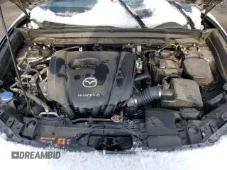 2020 Mazda CX-30 Premium z VIN 3MVDMBEM9LM127150, wystawiony jako Copart lot #51527295 z przebiegiem 27 207 mil mil oraz Szkoda całkowita • Salvage title. Historia ofert i sprzedaży dostępna na DreamBid. Obrazek 12.