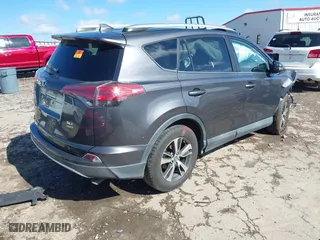 2016 Toyota RAV4 XLE with VIN 2T3RFREV4GW437875, listed as a IAAI auction lot 41694951 with 136,098 mi miles. Bid and sale history available at carsss.com. Image 4.