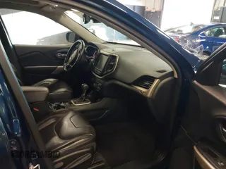 2018 Jeep Cherokee Limited with VIN 1C4PJMDXXJD611125, listed as a IAAI auction lot 41811985 with 148,956 mi miles. Bid and sale history available at carsss.com. Image 5.