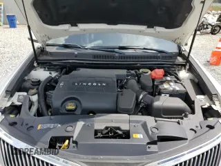 2013 Lincoln MKS with VIN 1LNHL9DK4DG612981, listed as a Copart auction lot 60701895 with 113,354 mi miles and Salvage title. Bid and sale history available at DreamBid. Image 11.