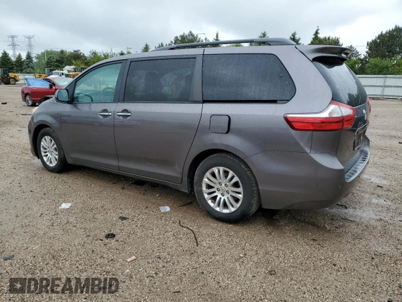2015 Toyota Sienna XLE with VIN 5TDYK3DC0FS686792, listed as a Copart auction lot 57472045 with 222,663 mi miles and Salvage title. Bid and sale history available at DreamBid. Image 2.