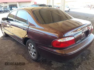 2002 Mazda 626 LX with VIN 1YVGF22C225291987, listed as a IAAI auction lot 41863018 with 111,362 mi miles. Bid and sale history available at carsss.com. Image 3.