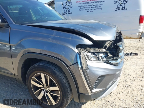 2021 Volkswagen Atlas SE z VIN 1V2DP2CA3MC518670, wystawiony jako IAAI lot #41860811 z przebiegiem 69 270 mil mil oraz . Historia ofert i sprzedaży dostępna na DreamBid. Obrazek 18.