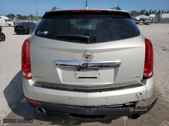 2014 Cadillac SRX Performance Collection with VIN 3GYFNCE3XES655115, listed as a Copart auction lot 89176625 with 144,639 mi miles and Salvage Title. Bid and sale history available at carsss.com. Image 6.