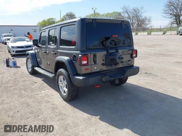 2019 Jeep Wrangler Unlimited Sport S with VIN 1C4HJXDG0KW541940, listed as a IAAI auction lot 42100255 with 68,309 mi miles and . Bid and sale history available at DreamBid. Image 3.