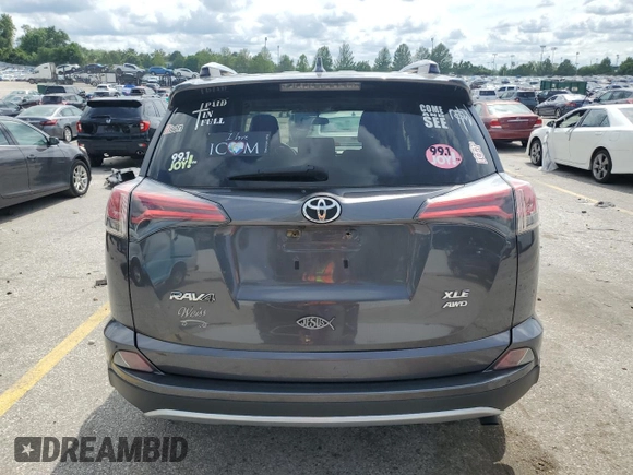 2016 Toyota RAV4 XLE with VIN JTMRFREV6GJ099720, listed as a Copart auction lot 60200585 with 148,801 mi miles and Salvage title. Bid and sale history available at DreamBid. Image 6.