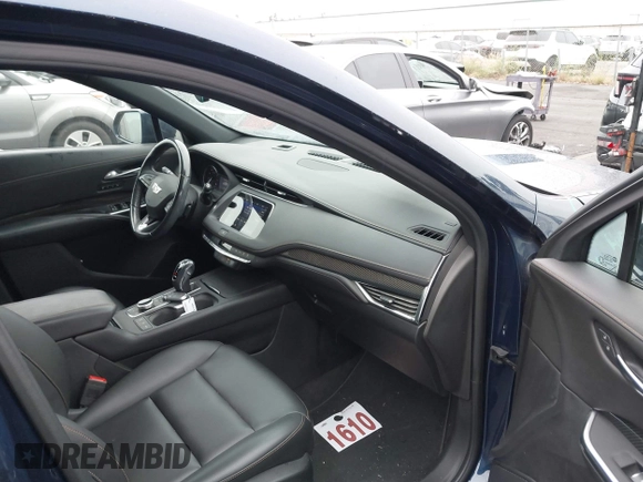 2019 Cadillac XT4 FWD Sport with VIN 1GYFZER47KF188903, listed as a IAAI auction lot 42391438 with 29,193 mi miles and . Bid and sale history available at DreamBid. Image 5.