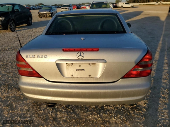 2001 Mercedes-Benz SLK-Class with VIN WDBKK65F31F230678, listed as a Copart auction lot 84119664 with 94,941 mi miles and Salvage Title. Bid and sale history available at carsss.com. Image 6.