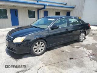 2005 Toyota Avalon XL z VIN 4T1BK36B05U022928, wystawiony jako Copart lot #59137785 z przebiegiem 146 854 mil mil oraz Szkoda całkowita • Salvage title. Historia ofert i sprzedaży dostępna na DreamBid. Obrazek 1.