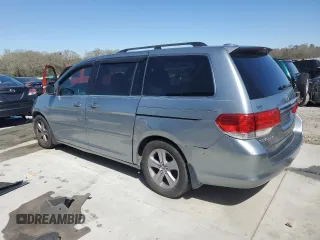 2010 Honda Odyssey Touring with VIN 5FNRL3H97AB096960, listed as a Copart auction lot 49291025 with 167,224 mi miles and Salvage Title. Bid and sale history available at carsss.com. Image 2.
