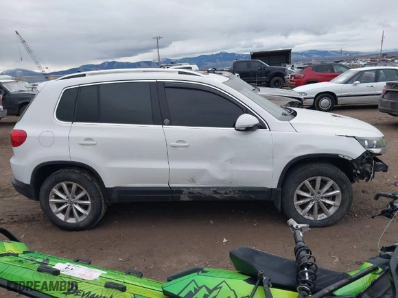 2017 Volkswagen Tiguan Wolfsburg Edition with VIN WVGSV7AX6HK003768, listed as a IAAI auction lot 41137411 with 117,862 mi miles. Bid and sale history available at carsss.com. Image 14.