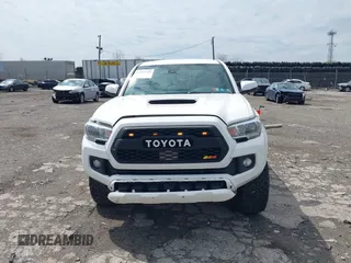 2018 Toyota Tacoma SR with VIN 3TMCZ5AN5JM125066, listed as a IAAI auction lot 41961168 with 88,497 mi miles. Bid and sale history available at carsss.com. Image 12.