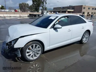 2017 Audi A4 Premium with VIN WAUANAF40HN011047, listed as a IAAI auction lot 41824638 with 107,802 mi miles. Bid and sale history available at carsss.com. Image 2.