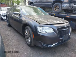 2017 Chrysler 300 with VIN 2C3CCAEG2HH588009, listed as a IAAI auction lot 42035609 with 204,795 mi miles. Bid and sale history available at carsss.com. Image 1.