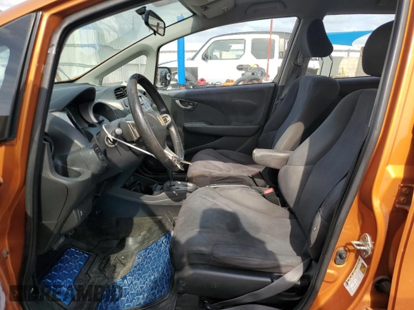 2011 Honda Fit Sport with VIN JHMGE8H59BC007883, listed as a Copart auction lot 54194635 with 123,256 mi miles and Salvage Title. Bid and sale history available at DreamBid. Image 7.