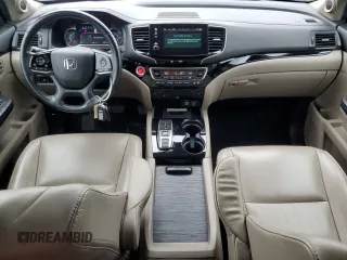 2019 Honda Pilot Touring 8-Passenger with VIN 5FNYF6H94KB056213, listed as a Copart auction lot 56429585 with 106,735 mi miles and Salvage title. Bid and sale history available at DreamBid. Image 8.