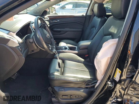 2014 Cadillac SRX Luxury Collection z VIN 3GYFNEE32ES647165, wystawiony jako Copart lot #52331335 z przebiegiem 27 277 mil mil oraz Szkoda całkowita • Salvage title. Historia ofert i sprzedaży dostępna na DreamBid. Obrazek 7.