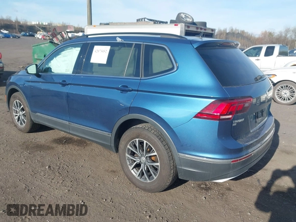 2020 Volkswagen Tiguan SE with VIN 3VV2B7AX2LM017277, listed as a IAAI auction lot 42075052 with 72,248 mi miles and . Bid and sale history available at DreamBid. Image 3.