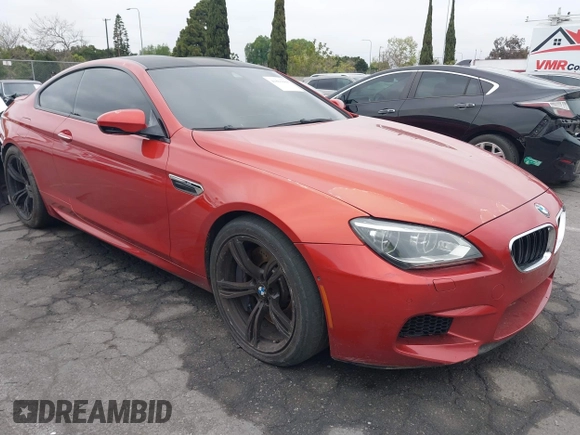 2013 BMW M6 z VIN WBSLX9C55DC968497, wystawiony jako IAAI lot #41863884 z przebiegiem 128 241 mil mil oraz . Historia ofert i sprzedaży dostępna na DreamBid. Obrazek 14.