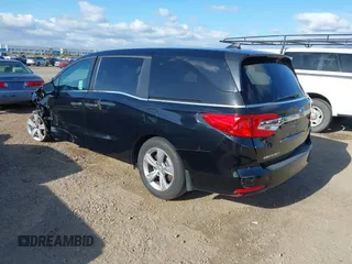 2019 Honda Odyssey EX with VIN 5FNRL6H54KB036540, listed as a IAAI auction lot 42124939 with 135,417 mi miles. Bid and sale history available at carsss.com. Image 3.