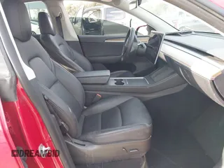 2023 Tesla Model Y Long Range with VIN 7SAYGAEE7PF713761, listed as a IAAI auction lot 41638067 with 46,089 mi miles and . Bid and sale history available at DreamBid. Image 5.