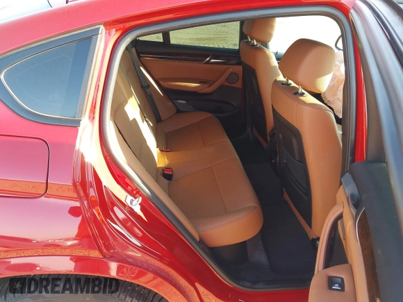 2018 BMW X4 xDrive28i z VIN 5UXXW3C57J0Z60681, wystawiony jako IAAI lot #42014416 z przebiegiem 65 168 mil mil oraz . Historia ofert i sprzedaży dostępna na DreamBid. Obrazek 8.