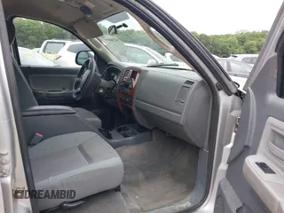 2005 Dodge Dakota SLT with VIN 1D7HW48N65S199887, listed as a IAAI auction lot 42508977 with 192,330 mi miles and . Bid and sale history available at DreamBid. Image 5.