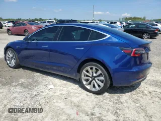 2020 Tesla Model 3 Long Range with VIN 5YJ3E1EB4LF744575, listed as a Copart auction lot 50202375 with 61,357 mi miles and Salvage Title. Bid and sale history available at carsss.com. Image 2.