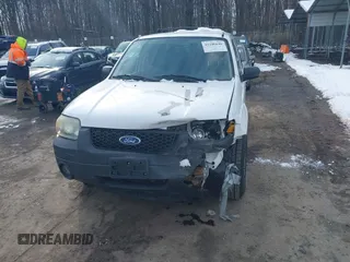 2006 Ford Escape Hybrid with VIN 1FMYU96H06KA26079, listed as a IAAI auction lot 41246646 with 105,658 mi miles and . Bid and sale history available at DreamBid. Image 13.