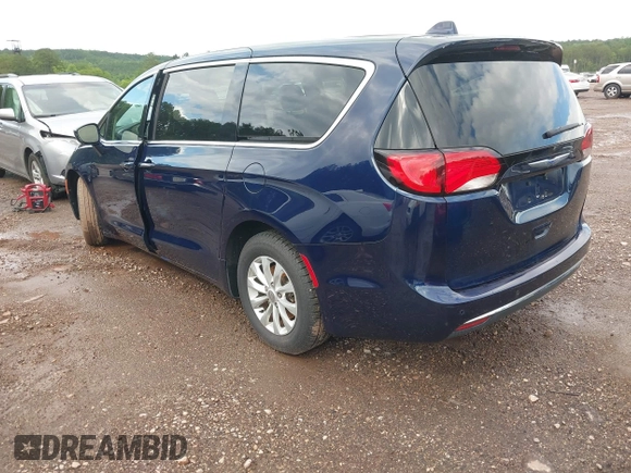 2018 Chrysler Pacifica Touring Plus with VIN 2C4RC1FG9JR261689, listed as a IAAI auction lot 42261105 with 66,622 mi miles and . Bid and sale history available at DreamBid. Image 3.
