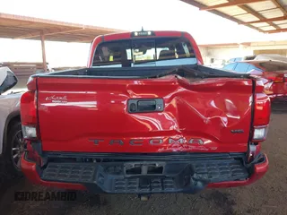2018 Toyota Tacoma SR with VIN 3TMCZ5AN8JM141486, listed as a IAAI auction lot 42142145 with 54,851 mi miles and . Bid and sale history available at DreamBid. Image 16.