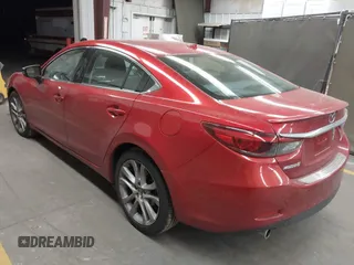 2016 Mazda 6 i Grand Touring с VIN JM1GJ1W50G1474054, выставлен на аукционе IAAI как лот 42162163 с пробегом 97 169 миль миль и . История ставок и продаж доступна на DreamBid. Изображение 3.