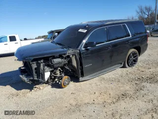 2019 Chevrolet Tahoe LT with VIN 1GNSCBKC5KR353908, listed as a Copart auction lot 41826985 with 97,949 mi miles and Clean Title. Bid and sale history available at carsss.com. Image 1.