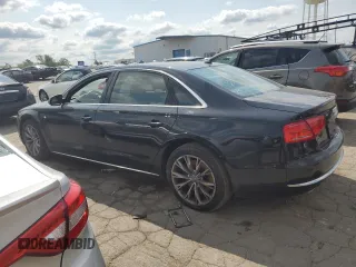2011 Audi A8 z VIN WAURVAFD9BN005595, wystawiony jako Copart lot #66302644 z przebiegiem 106 610 mil mil oraz Nie do naprawy. Historia ofert i sprzedaży dostępna na DreamBid. Obrazek 2.