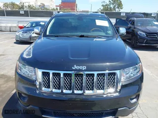 2012 Jeep Grand Cherokee Overland with VIN 1C4RJFCT7CC185602, listed as a IAAI auction lot 42018715 with 91,507 mi miles. Bid and sale history available at carsss.com. Image 12.