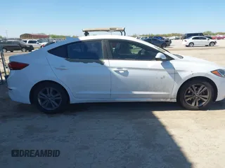 2017 Hyundai Elantra SE z VIN 5NPD84LF7HH129904, wystawiony jako IAAI lot #41837435 z przebiegiem 97 737 mil mil oraz . Historia ofert i sprzedaży dostępna na DreamBid. Obrazek 14.