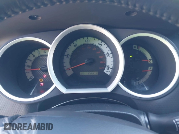2014 Toyota Tacoma with VIN 5TFLU4EN4EX095917, listed as a IAAI auction lot 41820691 with 59,823 mi miles and . Bid and sale history available at DreamBid. Image 7.