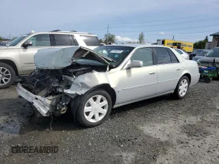 2006 Cadillac DTS 1SD z VIN 1G6KD57Y36U140554, wystawiony jako Copart lot #51965745 z przebiegiem Nie podano mil oraz Szkody całkowita. Historia ofert i sprzedaży dostępna na DreamBid. Obrazek 1.